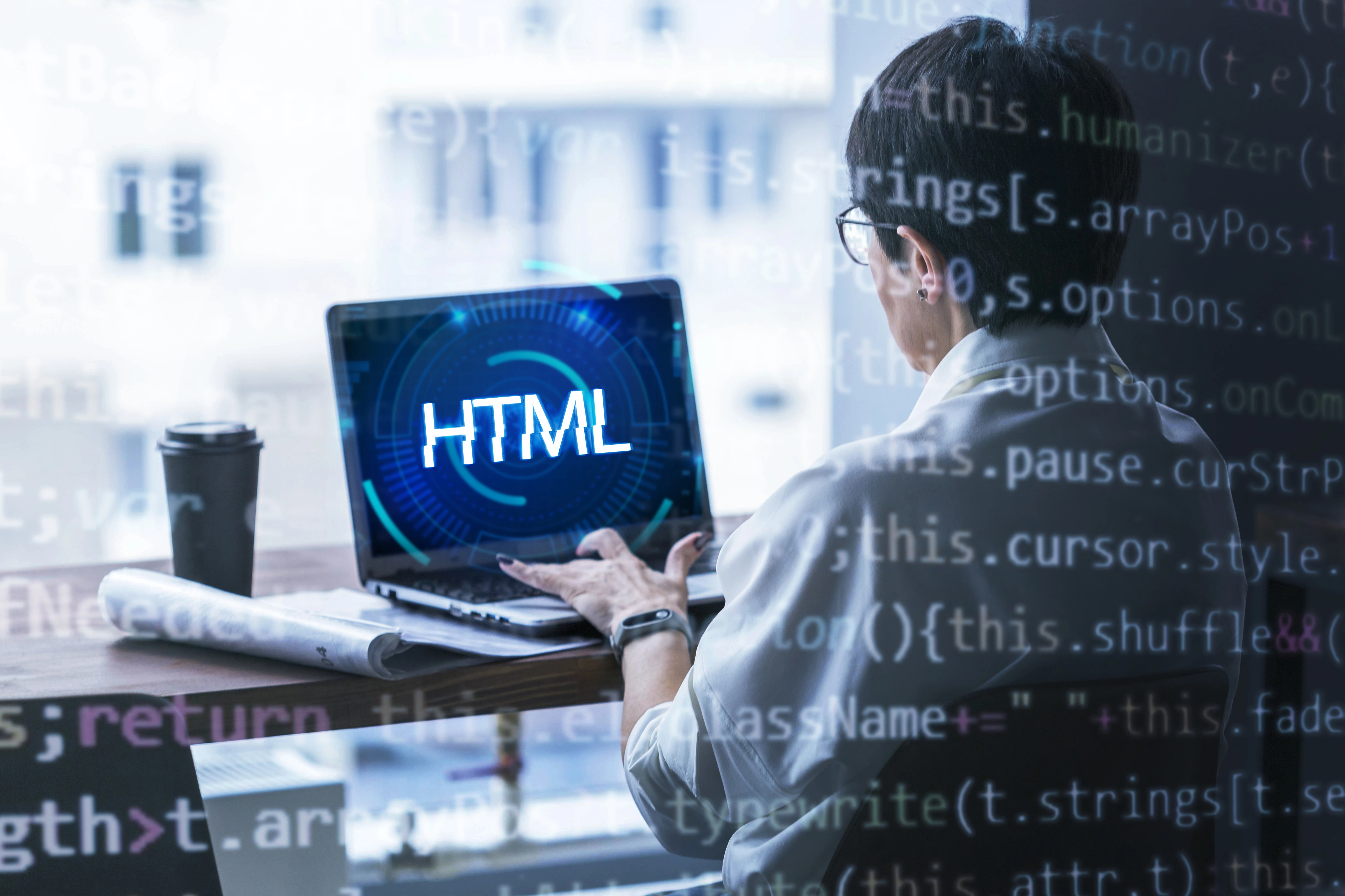 Person typing on laptop showing 